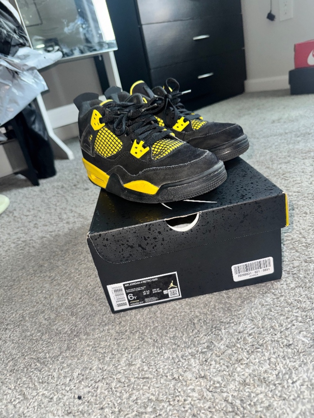 Black & Yellow “Thunder” Jordan 4